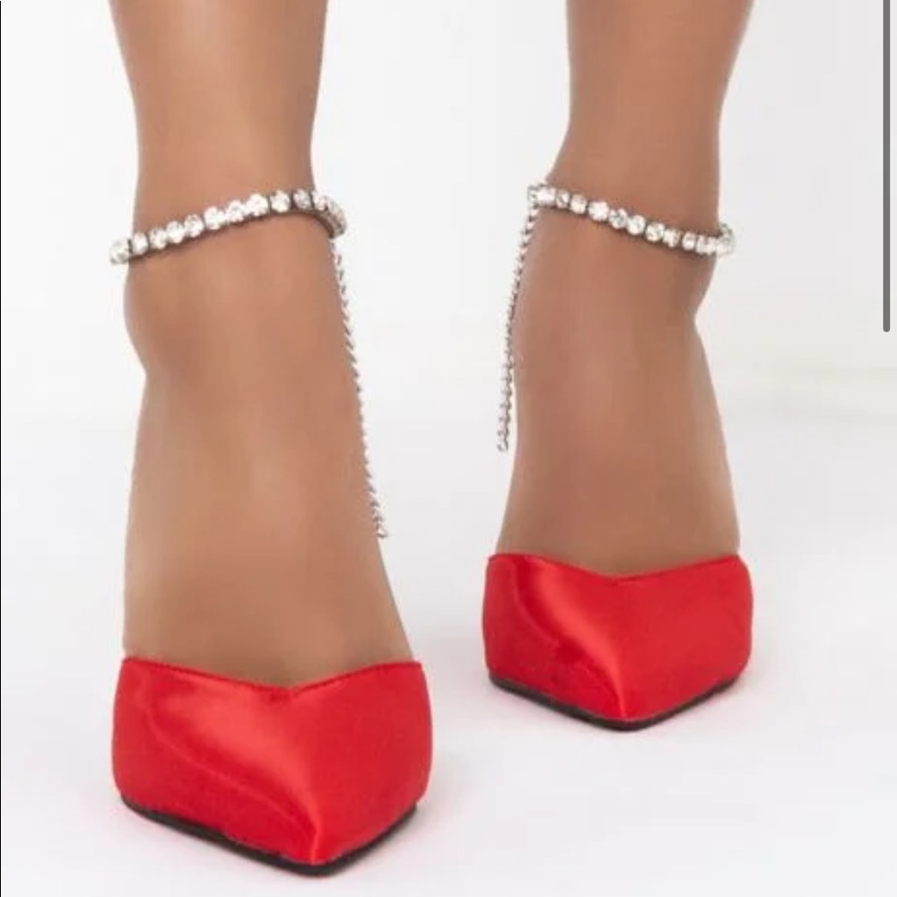 Red pointed toe pumps